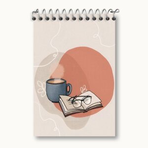 دفتر یادداشت کتاب و فنجان قهوه